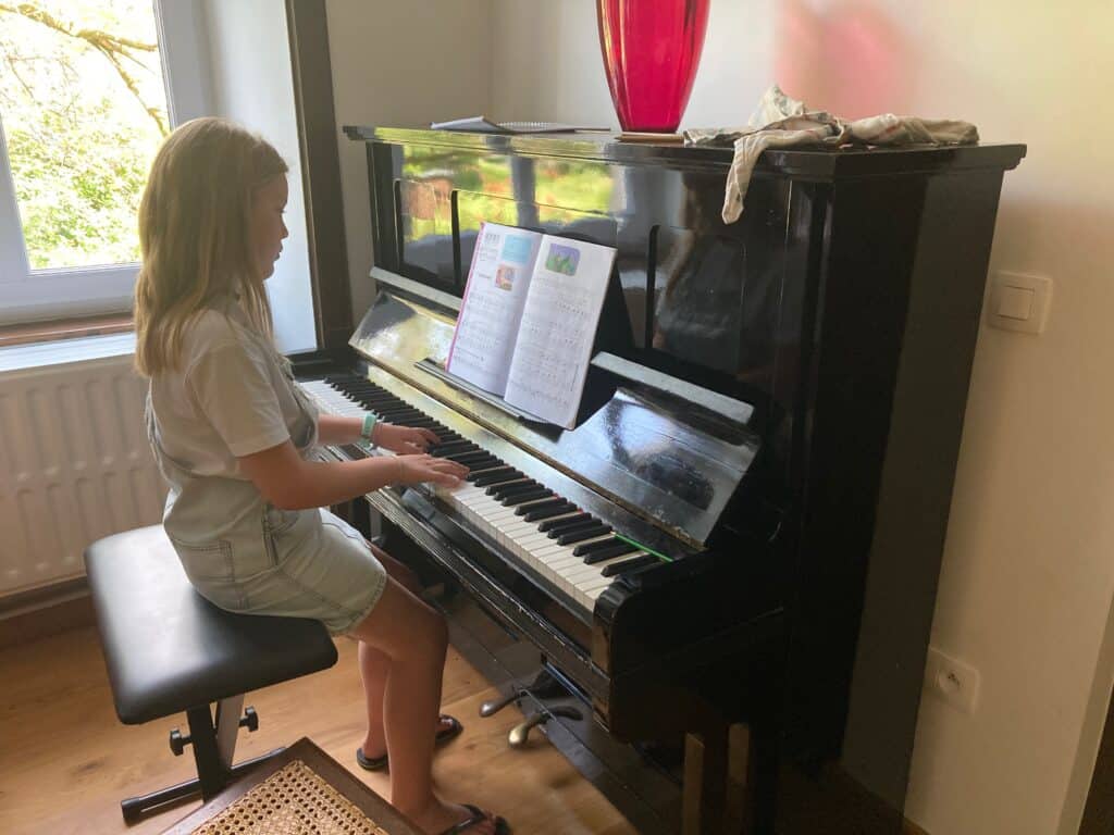 leerling aan de piano
